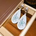 Silver needle drop earrings with white lily pattern and polished metallic beads - 925 Sterling Silver Earring Post (14) / White-Silver