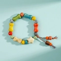 Colorful Jingdezhen ceramic bracelet with bone and star beads on a multi-color braided rope - Childlike Ceramic Wood Style (1598-02) / Colorful Childlike