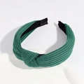 Cross-knotted wide headband made of ribbed dark green fabric with a stylish twist - Dark Green