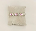 Italienisches Stretch-Armband aus Silberstahl mit lila Ovalsteinen und Goldakzenten - Violett