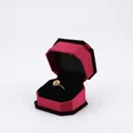 Octagonal rose red jewelry box with black velvet lining and a gold flower ring inside - Ring Box / Bordeaux With Black Interior