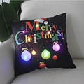 Detail of a black LED Christmas pillow with glowing ornaments and Merry Christmas text - Black Christmas Ball Print-21M-11