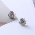 Macro detail of silver heart earrings featuring pave-set white round crystals - D26 Silver Shiny Heart