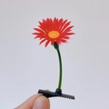 Cute red sunflower hair clip with yellow pistil and green stem on metal duckbill clip - Red Sunflower