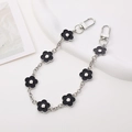 Detail of silver metal chain with black plum blossom charms and swivel lobster clasps - K886 Enamel Flower Chain