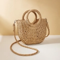 Handwoven straw half-moon handbag in natural beige with round handles and shoulder strap - Camel