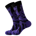 Detail shot of purple Halloween crew socks featuring black bats with green eye accents - Dark Purple Bat