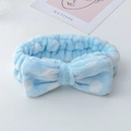 Blue plush headband with white polka dots and a bow for makeup and face washing - Blue Polka Dot