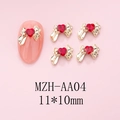 Detail van 11x10mm gouden nail art strik met rode hart strassteen op roze nagel - Gouden Basis Rood Hart (AA04)