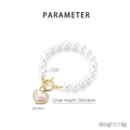 Detalle de pulsera de perlas con cierre OT dorado y colgante de corazón con diamantes - Corazón Irisado con Diamantes de Imitación (KB203123-SXSJ)