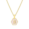 Close-up of golden hexagonal pendant with pink shell inlay and letter B on a thin chain - Letter B (Gold/With Chain)