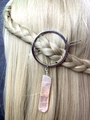 Detailed view of silver circular hair clip with natural pink crystal pendant on hair - Rose Quartz Round Hair Slide