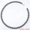 Detailed macro of flower necklace with white diamonds and black petals, 8mm width - Platinum Black Zirconia Necklace (VL526)