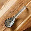 Japanese style blue swirl ceramic soup spoon on wood board, 15.5cm length - Circle Spiral