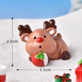 Miniature resin Christmas reindeer figurine in lying pose, 3.5cm long festive decor - No.2 Lying with Gift