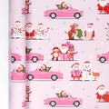 Pink Christmas wrapping paper roll with festive Santa, elk, and snowman illustrations - Pink Santa Claus