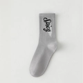 Calze da uomo grigio chiaro in cotone a coste con ricamo Spicy nero in corsivo - Taglia unica / Grigio chiaro