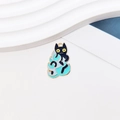 Detail showing a black cartoon cat enamel charm with a blue leaf and golden metal border - 3#