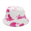 Close-up of soft pink and white cow print faux fur bucket hat with plush texture - M (56-59cm) / Rose Red