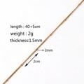 Macro shot of 1.5mm gold beaded chain with 40+5cm length and 2g weight details - Curb Cylinder Chain