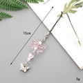 Portachiavi con fiocco rosa, perle a cuore e ciondolo farfalla, vista dettaglio da 15cm - Fiocco Rosa + Ciondolo Farfalla