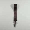 Close-up of a dark brown woven nylon wristlet keychain with silver metal spring hook - Brown