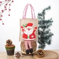 Bolsa de regalo navideña de yute con diseño de Papá Noel y patas colgantes a rayas - Santa Claus