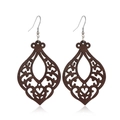 Macro detail of dark brown teardrop wood hollow earrings with silver metal hooks - Style 44