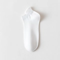 Women's low cut white cotton sports socks with ribbed cuffs and heel tab feature - One Size / White