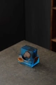 Blue resin square coasters with natural wood slice inserts in a matching U-shaped holder - Blue Square Pine Wood Coasters Set With Base