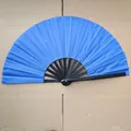 Vibrant bright blue folding fan with premium black bamboo ribs in a fully open display - Solid Blue Style (A18)