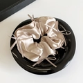 Elegant beige satin scrunchie with silk ribbon bows for French ballet style hair styling - Champagne
