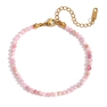 Pink natural stone beaded bracelet with 18K gold plated clasp on white background - Pink Opal