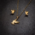 Golden bird pendant necklace and stud earrings jewelry set on a black textured background - Golden Bird (151)