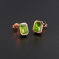 Detail of emerald cut green zircon earrings in rose gold bezel setting with butterfly back - Rose Gold Plated Olive Green Zirconia