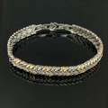 Elegante bracciale bicolore oro e argento a maglia intrecciata a V con finitura lucida - Bracciale Geometrico Bicolore SL604