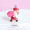 Macro view of 2.5x3cm resin Santa Claus pendant with red glitter for DIY Christmas crafts - Style 29-Glitter Santa Figure