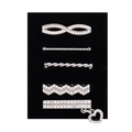 Detailed silver alloy crystal studs set for Apple Watch band shown on black display - D3039 Bowtie/W-Shape Set 29