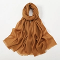 Detailed texture of brown slub cotton scarf with fine fringe edges on white background - Dark Camel