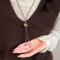 Collana lunga vintage con ciondolo a cavallo a dondolo in legno e stella d'argento - Collana in Corda Cerata con Ciondolo a Forma di Cavallo in Legno Stella e Sfera