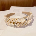 Detailed view of beige baroque headband with seashells, pearls and rhinestones decoration - Style O (Beige Various Shells)