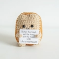 Handmade crochet toast doll holding a funny positive card for desk decor and stress relief - Toast Brown