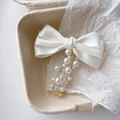 Elegant cream white bow hair claw clip with pearl accents in eco-friendly packaging - Clear Spiral Cord/Cream White Pearl / White Bowknot (White Pearl)