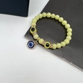 Luminous Evil Eye beaded bracelet with yellow glow-in-the-dark stones and blue charms - Luminous Stone Light Yellow