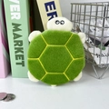 Detail of plush turtle coin purse with green velvet fabric and stitched shell texture - Money Turtle Coin Purse