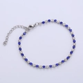 Silver stainless steel tennis bracelet featuring alternating blue and white cubic zirconia - Steel