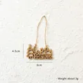 Wooden Christmas tree pendant featuring Happy CHRISTMAS cutout and rustic hanging string - 8CM Christmas Tree Letter Sign