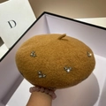 Detailed macro of camel wool beret featuring shiny silver star rhinestone decorations - M (56-58cm) / Camel