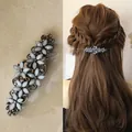 Elegant vintage spring hair clip featuring blue flowers and bronze rhinestones - Gray - Curved Flower Vintage Spring Clip