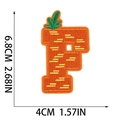 Detailed embroidery patch of letter P with carrot design including size markings - Letter F